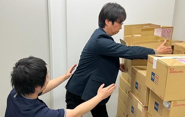 作業現場での姿勢指導の様子