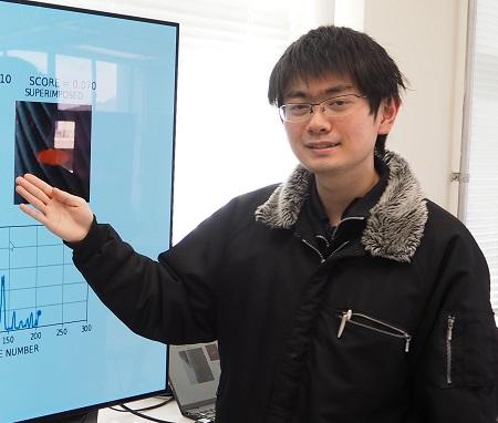 「AI送電線点検システム」を説明する武智さん